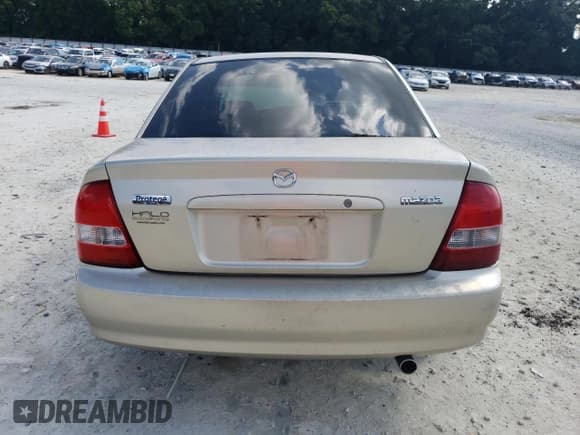 ✅ 2001 Mazda Protege DX • VIN: JM1BJ222710423952 • Лот: 72344954. Опубликован ранее на Copart с пробегом 178 099 миль. Бесплатный доступ к архиву аукционных продаж из США и подробный отчёт об истории автомобиля на DreamBid. Изображение 6.