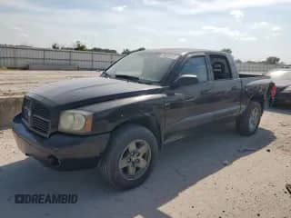 2006 Dodge Dakota SLT с VIN 1D7HE48K36S702687, выставлен на аукционе Copart как лот 68654315 с пробегом 210 276 миль миль и Списание • Salvage title. История ставок и продаж доступна на DreamBid. Изображение 1.