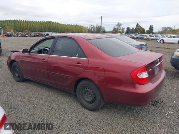 ✅ 2004 Toyota Camry LE • VIN: JTDBE32K340255550 • Lot: 43523031. Listed on IAAI with 160,108 mi. Free auction sales archive from the USA and detailed vehicle history report at DreamBid. Image 3.