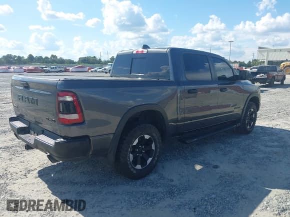 ✅ 2021 Ram 1500 Rebel • VIN: 1C6SRFLT9MN634673 • Lot: 40227246. Listed on IAAI with 39,061 mi. Free auction sales archive from the USA and detailed vehicle history report at DreamBid. Image 4.