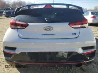 2020 Hyundai Veloster z VIN KMHT36AH1LU005521, wystawiony jako Copart lot #81643194 z przebiegiem Nie podano mil oraz Szkoda całkowita • Salvage title. Historia ofert i sprzedaży dostępna na DreamBid. Obrazek 6.