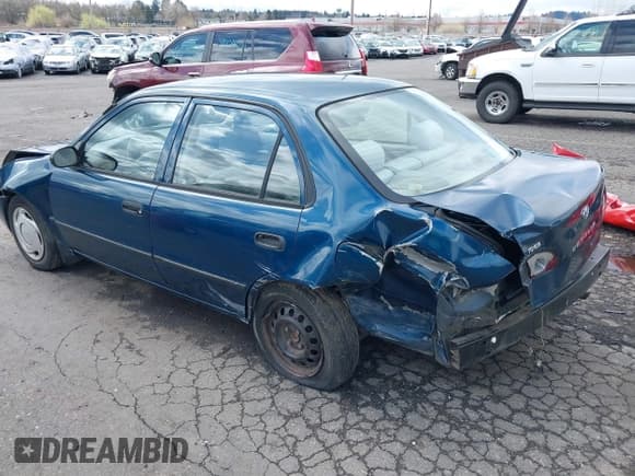 ✅ 1999 Toyota Corolla VE • VIN: 1NXBR12E7XZ192769 • Lot: 41825479. Listed on IAAI with 143,378 mi. Free auction sales archive from the USA and detailed vehicle history report at DreamBid. Image 3.