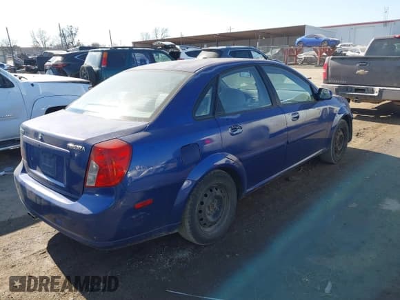 ✅ 2005 Suzuki Forenza S • VIN: KL5JD56Z85K111425 • Lot: 41421881. Listed on IAAI with 18,478 mi. Free auction sales archive from the USA and detailed vehicle history report at DreamBid. Image 4.