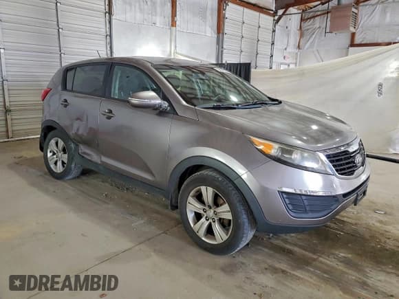 ✅ 2012 Kia Sportage LX • VIN: KNDPB3A26C7198136 • Lot: 94096325. Listed on Copart with 181,614 mi. Free auction sales archive from the USA and detailed vehicle history report at DreamBid. Image 4.