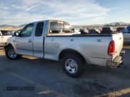✅ 2000 Ford F-150 XL • VIN: 1FTRX17W4YKB41883 • Lot: 92127065. Listed on Copart with 170,725 mi. Free auction sales archive from the USA and detailed vehicle history report at DreamBid. Image 2.