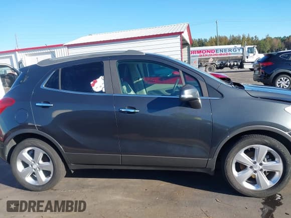 ✅ 2016 Buick Encore Convenience • VIN: KL4CJBSB8GB745592 • Лот: 43468567. Опубликован ранее на IAAI с пробегом 129 804 миль. Бесплатный доступ к архиву аукционных продаж из США и подробный отчёт об истории автомобиля на DreamBid. Изображение 14.