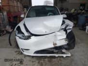 ✅ 2023 Tesla Model Y Long Range • VIN: 7SAYGAEEXPF789037 • Lot: 41551605. Listed on IAAI with 8,630 mi. Free auction sales archive from the USA and detailed vehicle history report at DreamBid. Image 12.