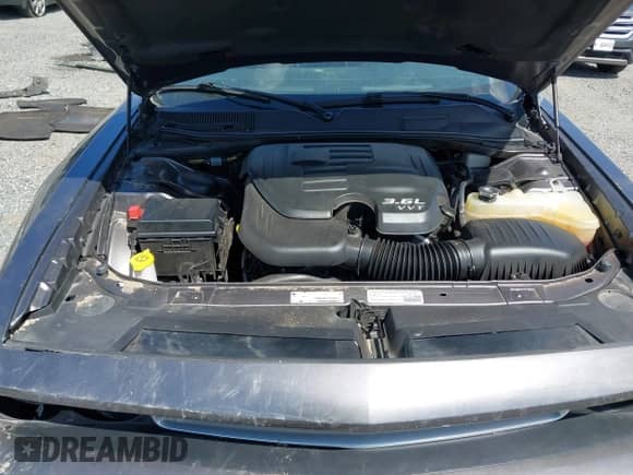 2014 Dodge Challenger SXT z VIN 2C3CDYAG3EH143382, wystawiony jako IAAI lot #43081160 z przebiegiem 35 011 mil mil oraz . Historia ofert i sprzedaży dostępna na DreamBid. Obrazek 10.