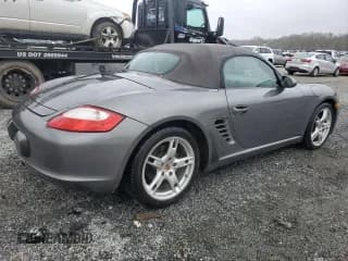 ✅ 2007 Porsche Boxster • VIN: WP0CA29857U711677 • Lot: 79859924. Listed on Copart with 83,123 mi. Free auction sales archive from the USA and detailed vehicle history report at DreamBid. Image 3.