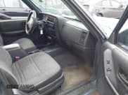 ✅ 1999 Jeep Cherokee Sport • VIN: 1J4FF68S7XL513640 • Lot: 42913382. Listed on IAAI with 207,133 mi. Free auction sales archive from the USA and detailed vehicle history report at DreamBid. Image 5.