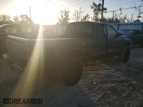 1998 Dodge Dakota SLT z VIN 1B7GG22X6WS619151, wystawiony jako Copart lot #78768394 z przebiegiem 139 243 mil mil oraz Szkoda całkowita • Salvage title. Historia ofert i sprzedaży dostępna na DreamBid. Obrazek 3.