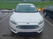 ✅ 2016 Ford Focus Titanium • VIN: 1FADP3N26GL387872 • Lot: 42183397. Listed on IAAI with 30,557 mi. Free auction sales archive from the USA and detailed vehicle history report at DreamBid. Image 12.