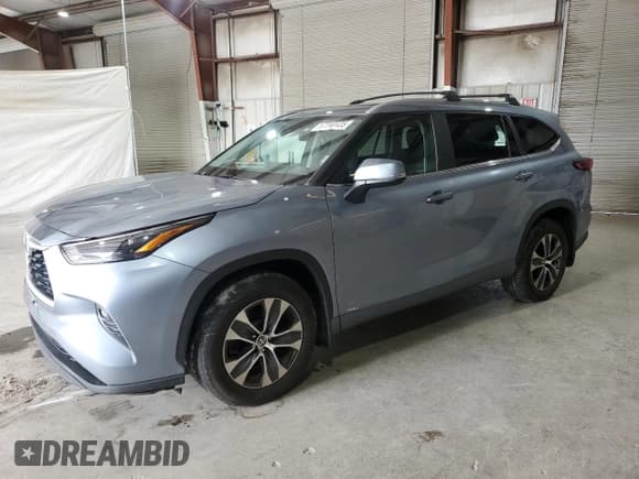 ✅ 2023 Toyota Highlander Hybrid XLE • VIN: 5TDKBRCH1PS106456 • Lot: 67240425. Listed on Copart with 295,759 mi. Free auction sales archive from the USA and detailed vehicle history report at DreamBid. Image 1.