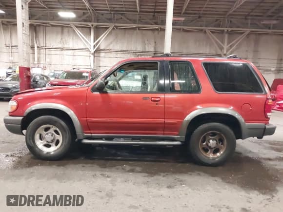 ✅ 1999 Ford Explorer Sport • VIN: 1FMZU24E2XUA40849 • Lot: 41250506. Listed on IAAI with 174,706 mi. Free auction sales archive from the USA and detailed vehicle history report at DreamBid. Image 14.