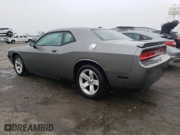 2011 Dodge Challenger R/T z VIN 2B3CJ5DT5BH590837, wystawiony jako Copart lot #72770514 z przebiegiem 226 167 mil mil oraz Szkoda całkowita • Salvage title. Historia ofert i sprzedaży dostępna na DreamBid. Obrazek 2.