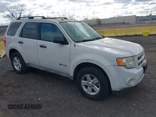✅ 2009 Ford Escape Hybrid • VIN: 1FMCU59399KB39651 • Lot: 43716212. Listed on IAAI with 113,770 mi. Free auction sales archive from the USA and detailed vehicle history report at DreamBid. Image 1.