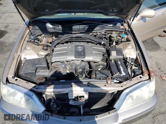 ✅ 1999 Acura RL • VIN: JH4KA9650XC002240 • Лот: 48760975. Опубликован ранее на Copart с пробегом Не указан. Бесплатный доступ к архиву аукционных продаж из США и подробный отчёт об истории автомобиля на DreamBid. Изображение 11.