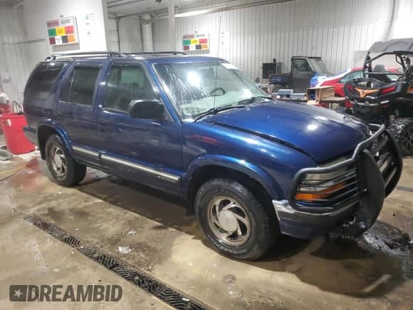 2001 Chevrolet Blazer LT with VIN 1GNDT13W912134288, listed as a Copart auction lot 87112824 with 152,925 mi miles and Salvage title. Bid and sale history available at DreamBid. Image 4.