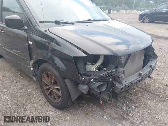 2014 Dodge Grand Caravan SXT z VIN 2C4RDGCG7ER450769, wystawiony jako IAAI lot #42731156 z przebiegiem 85 908 mil mil oraz . Historia ofert i sprzedaży dostępna na DreamBid. Obrazek 6.