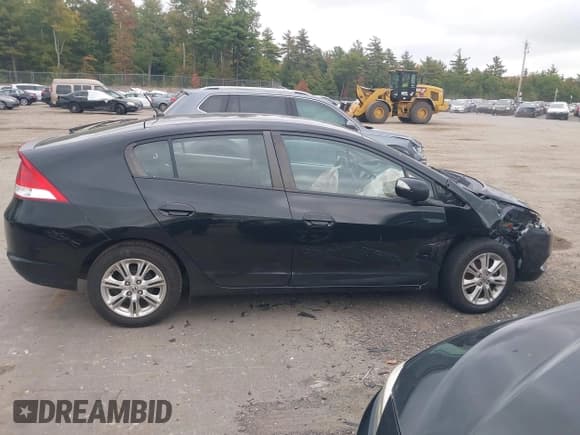 ✅ 2011 Honda Insight EX • VIN: JHMZE2H75BS002662 • Lot: 43283210. Listed on IAAI with 279,188 mi. Free auction sales archive from the USA and detailed vehicle history report at DreamBid. Image 13.