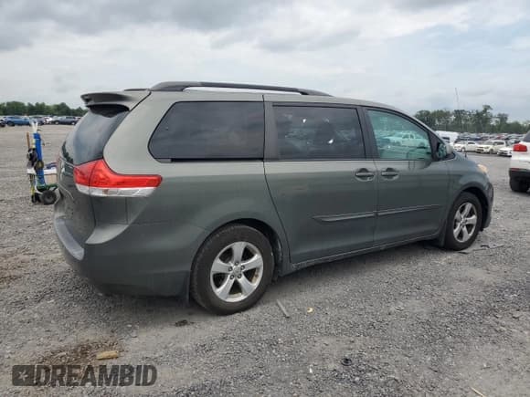 ✅ 2012 Toyota Sienna LE AAS • VIN: 5TDKK3DC5CS199833 • Lot: 65168885. Listed on Copart with 128,047 mi. Free auction sales archive from the USA and detailed vehicle history report at DreamBid. Image 3.