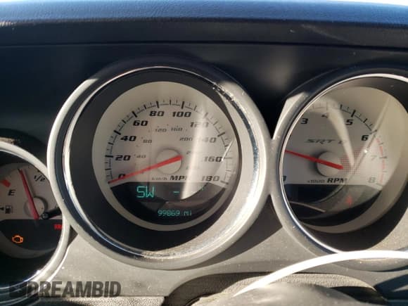 ✅ 2010 Dodge Challenger SRT-8 • VIN: 2B3CJ7DW0AH278915 • Lot: 74315243. Listed on Copart with 99,869 mi. Free auction sales archive from the USA and detailed vehicle history report at DreamBid. Image 9.