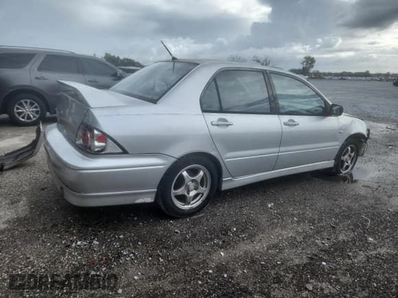 ✅ 2003 Mitsubishi Lancer OZ-Rally • VIN: JA3AJ86E93U109636 • Lot: 70269295. Listed on Copart with 186,742 mi. Free auction sales archive from the USA and detailed vehicle history report at DreamBid. Image 3.