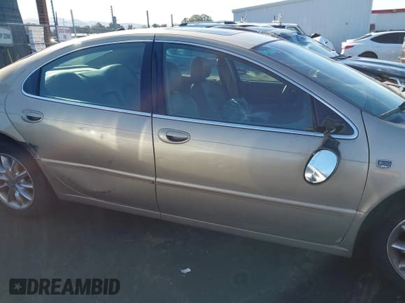 ✅ 2004 Chrysler 300M M • VIN: 2C3HE66G14H626738 • Lot: 43552216. Listed on IAAI with 120,689 mi. Free auction sales archive from the USA and detailed vehicle history report at DreamBid. Image 6.