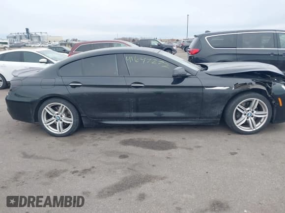 ✅ 2015 BMW 6 Series 650i xDrive • VIN: WBA6B4C50FD761614 • Лот: 41647272. Опубликован ранее на IAAI с пробегом 106 100 миль. Бесплатный доступ к архиву аукционных продаж из США и подробный отчёт об истории автомобиля на DreamBid. Изображение 13.