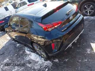 2019 Hyundai Veloster Premium с VIN KMHTG6AF7KU010854, выставлен на аукционе IAAI как лот 41386268 с пробегом 87 133 миль миль и . История ставок и продаж доступна на DreamBid. Изображение 3.