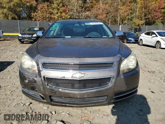 ✅ 2010 Chevrolet Malibu 1LT • VIN: 1G1ZC5E02AF243983 • Lot: 37243384. Listed on Copart with 157,502 mi. Free auction sales archive from the USA and detailed vehicle history report at DreamBid. Image 5.