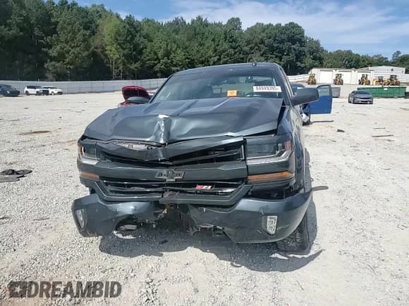✅ 2018 Chevrolet Silverado 1500 LT • VIN: 3GCUKREC3JG533072 • Лот: 84949395. Опубликован ранее на Copart с пробегом 85 589 миль. Бесплатный доступ к архиву аукционных продаж из США и подробный отчёт об истории автомобиля на DreamBid. Изображение 13.