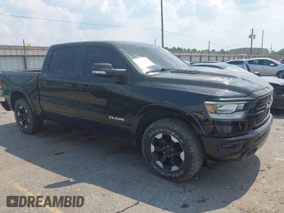 ✅ 2019 Ram 1500 Laramie • VIN: 1C6RREJT6KN684181 • Lot: 43251943. Listed on IAAI with 138,261 mi. Free auction sales archive from the USA and detailed vehicle history report at DreamBid. Image 1.