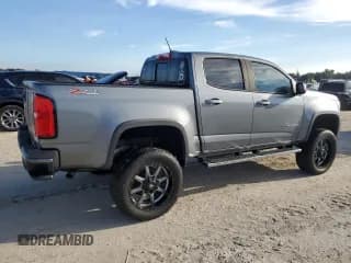 ✅ 2018 Chevrolet Colorado 4WD Z71 • VIN: 1GCGTDEN6J1288071 • Лот: 73642694. Опубликован ранее на Copart с пробегом Не указан. Бесплатный доступ к архиву аукционных продаж из США и подробный отчёт об истории автомобиля на DreamBid. Изображение 3.