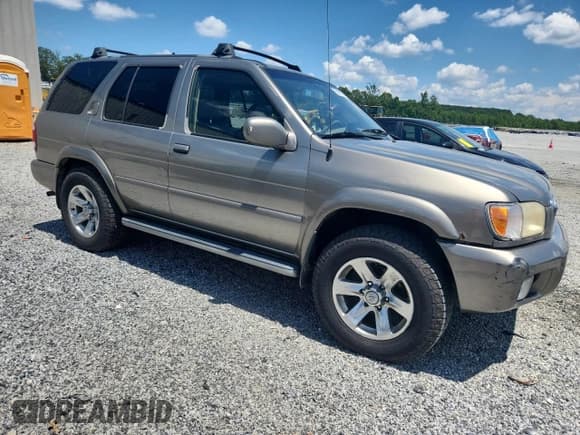 ✅ 2004 Nissan Pathfinder LE Platinum • VIN: JN8DR09Y84W912608 • Lot: 63467735. Listed on Copart with 171,191 mi. Free auction sales archive from the USA and detailed vehicle history report at DreamBid. Image 4.