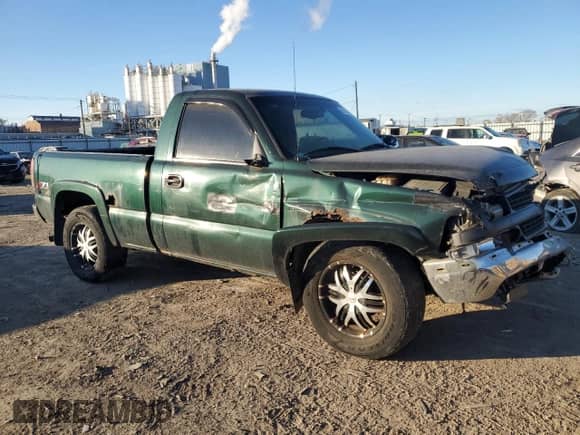 2002 Chevrolet Silverado 1500 LS with VIN 1GCEK14T42Z347338, listed as a Copart auction lot 87610705 with 298,775 mi miles and Salvage title. Bid and sale history available at DreamBid. Image 4.