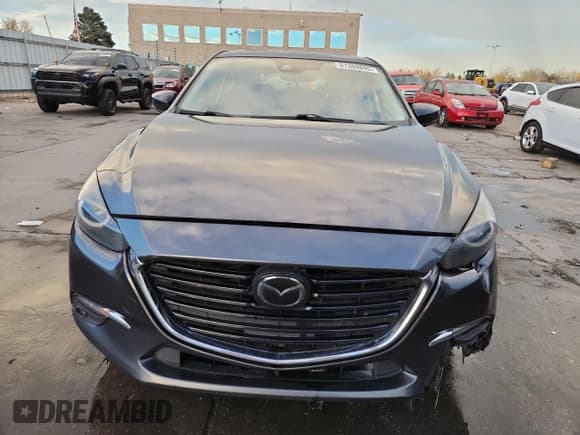 ✅ 2018 Mazda 3 Grand Touring • VIN: 3MZBN1M39JM265774 • Лот: 91309895. Опубликован ранее на Copart с пробегом 59 343 миль. Бесплатный доступ к архиву аукционных продаж из США и подробный отчёт об истории автомобиля на DreamBid. Изображение 5.