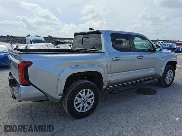 ✅ 2024 Toyota Tacoma SR5 • VIN: 3TMKB5FN8RM002169 • Lot: 60308275. Listed on Copart with 5,789 mi. Free auction sales archive from the USA and detailed vehicle history report at DreamBid. Image 3.