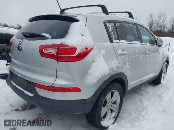 ✅ 2012 Kia Sportage LX • VIN: KNDPB3A23C7323299 • Lot: 43887981. Listed on IAAI with 527,900 mi. Free auction sales archive from the USA and detailed vehicle history report at DreamBid. Image 4.