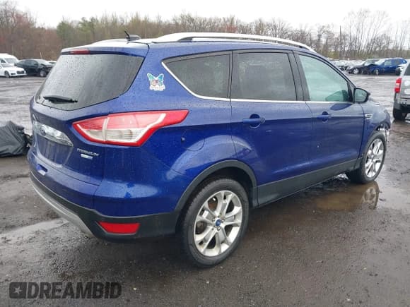 ✅ 2014 Ford Escape Titanium • VIN: 1FMCU9J99EUA46103 • Lot: 42018097. Wystawiony na IAAI z przebiegiem 169 878 mil. Bezpłatny archiwum sprzedaży aukcyjnych z USA i szczegółowy raport historii pojazdu na DreamBid. Zdjęcie 4.