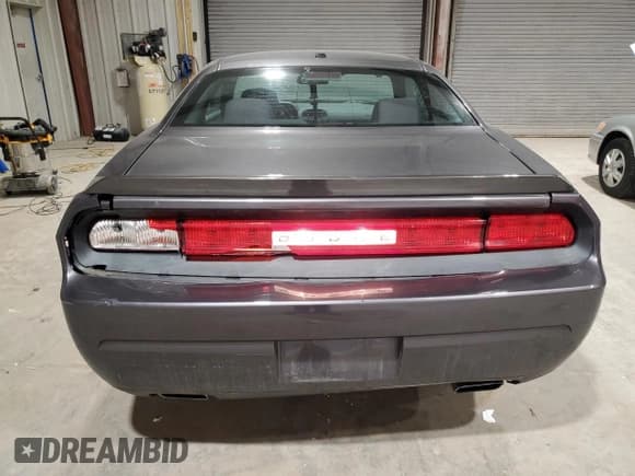 ✅ 2014 Dodge Challenger SXT • VIN: 2C3CDYAG9EH133472 • Lot: 44821425. Wystawiony na Copart z przebiegiem 132 298 mil. Bezpłatny archiwum sprzedaży aukcyjnych z USA i szczegółowy raport historii pojazdu na DreamBid. Zdjęcie 6.