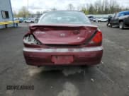 ✅ 2003 Kia Spectra • VIN: KNAFB121835211810 • Lot: 51289625. Listed on Copart with 133,868 mi. Free auction sales archive from the USA and detailed vehicle history report at DreamBid. Image 6.