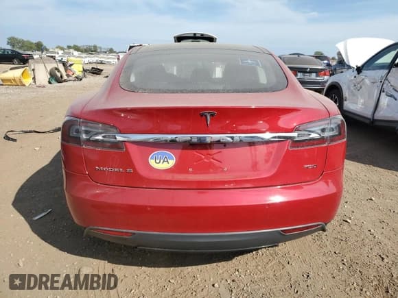 ✅ 2015 Tesla Model S 85D • VIN: 5YJSA1E23FF108872 • Lot: 71704065. Listed on Copart with 87,616 mi. Free auction sales archive from the USA and detailed vehicle history report at DreamBid. Image 6.