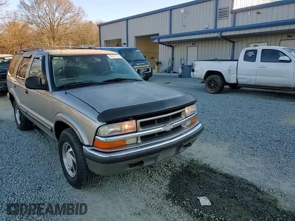 1998 Chevrolet Blazer LT с VIN 1GNDT13W2W2236765, выставлен на аукционе Copart как лот 88902125 с пробегом 227 773 миль миль и Списание • Salvage title. История ставок и продаж доступна на DreamBid. Изображение 12.