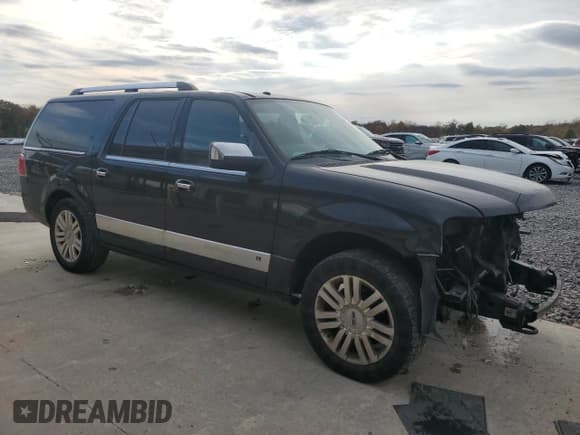 ✅ 2014 Lincoln Navigator • VIN: 5LMJJ3J5XEEL06994 • Lot: 91523045. Listed on Copart with 200,476 mi. Free auction sales archive from the USA and detailed vehicle history report at DreamBid. Image 4.