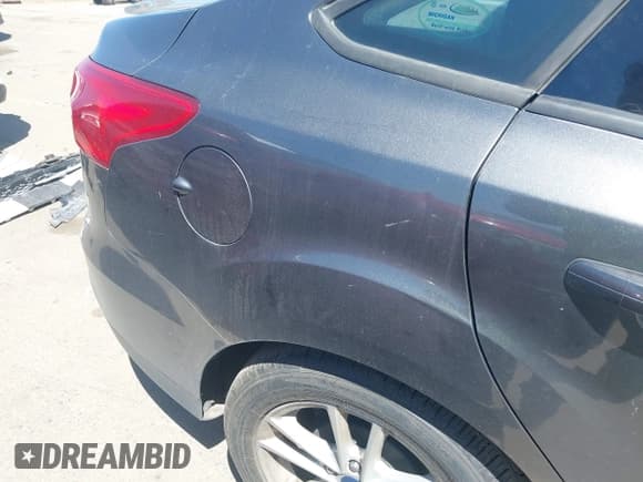 ✅ 2017 Ford Focus SE • VIN: 1FADP3F26HL308880 • Lot: 41991909. Listed on IAAI with 103,403 mi. Free auction sales archive from the USA and detailed vehicle history report at DreamBid. Image 16.