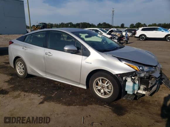 2022 Toyota Prius L Eco с VIN JTDKAMFU4N3168107, выставлен на аукционе Copart как лот 82113755 с пробегом 73 232 миль миль и Списание • Salvage title. История ставок и продаж доступна на DreamBid. Изображение 4.