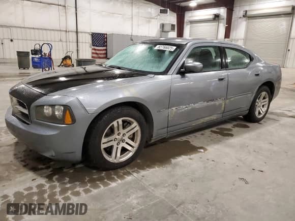 2006 Dodge Charger R/T with VIN 2B3KA53H76H148284, listed as a Copart auction lot 82766825 with 241,172 mi miles and Salvage title. Bid and sale history available at DreamBid. Image 1.
