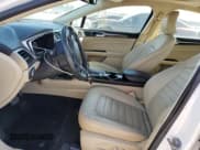 ✅ 2016 Ford Fusion SE Hybrid • VIN: 3FA6P0LU9GR157112 • Lot: 80173065. Listed on Copart with 84,969 mi. Free auction sales archive from the USA and detailed vehicle history report at DreamBid. Image 7.