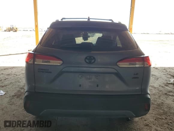 ✅ 2022 Toyota Corolla Cross LE • VIN: 7MUCAABG4NV033331 • Лот: 87089895. Опубликован ранее на Copart с пробегом 75 491 миль. Бесплатный доступ к архиву аукционных продаж из США и подробный отчёт об истории автомобиля на DreamBid. Изображение 6.